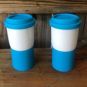 Set of 2 Sino Singware White Porcelain Travel Mugs  Blue Silicone Sleeves & Lids